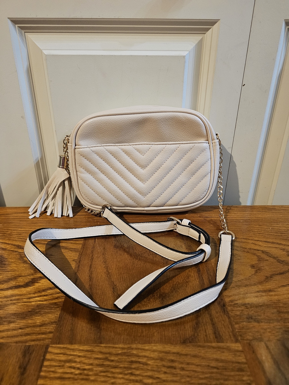 Cream Quilted Crossbody Bag with Tassel Accent